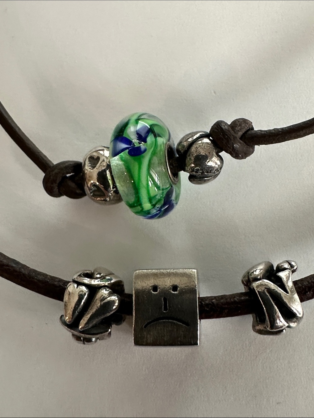 Pandora/trollbead sterling silver and Blue Glass Bead Leather necklaces.